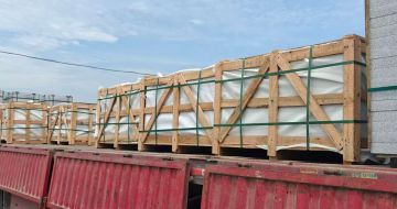 新疆 芝麻白花岗岩地铺石出口专车-泰国游