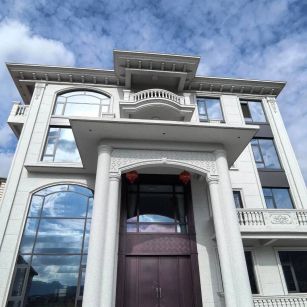 新疆白麻别墅外墙干挂石材效果示例