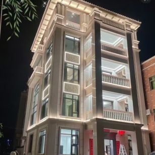 新疆 芝麻白花岗岩别墅外墙夜间效果