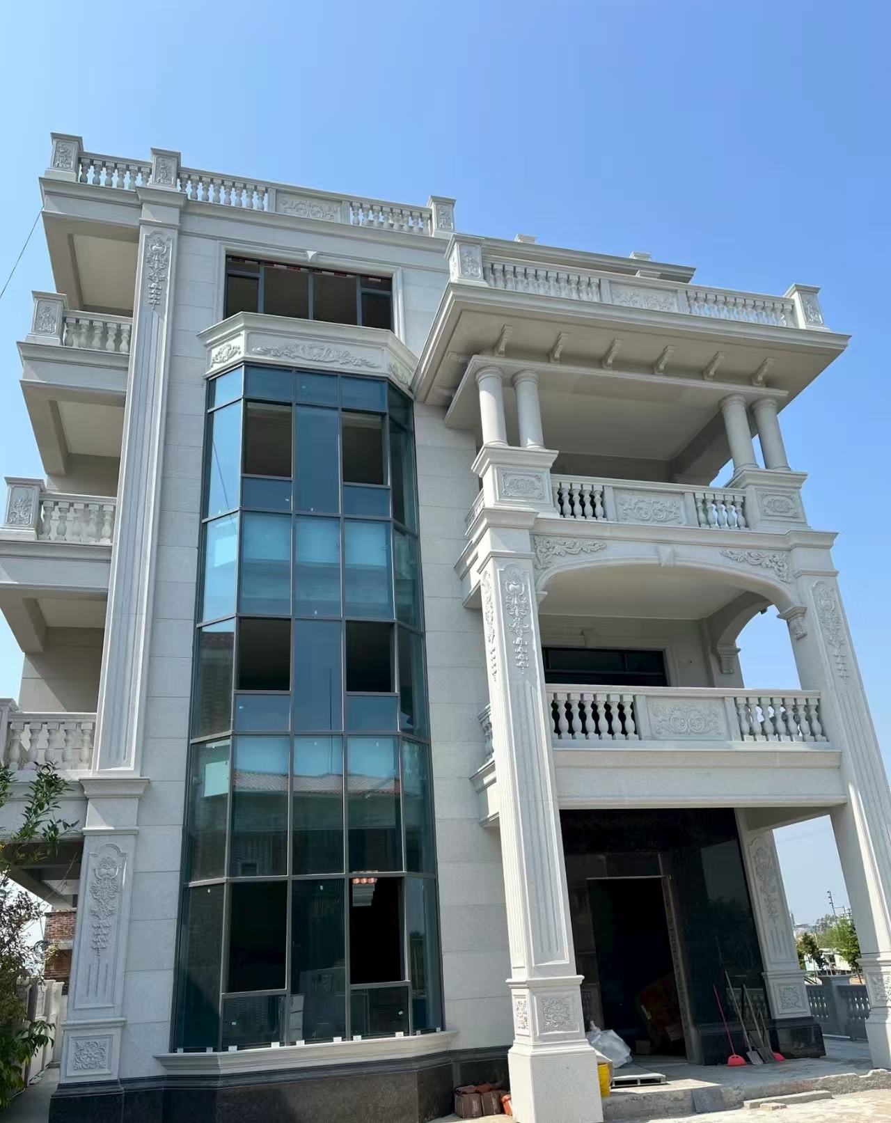 新疆 白麻花岗岩别墅外墙干挂效果展示